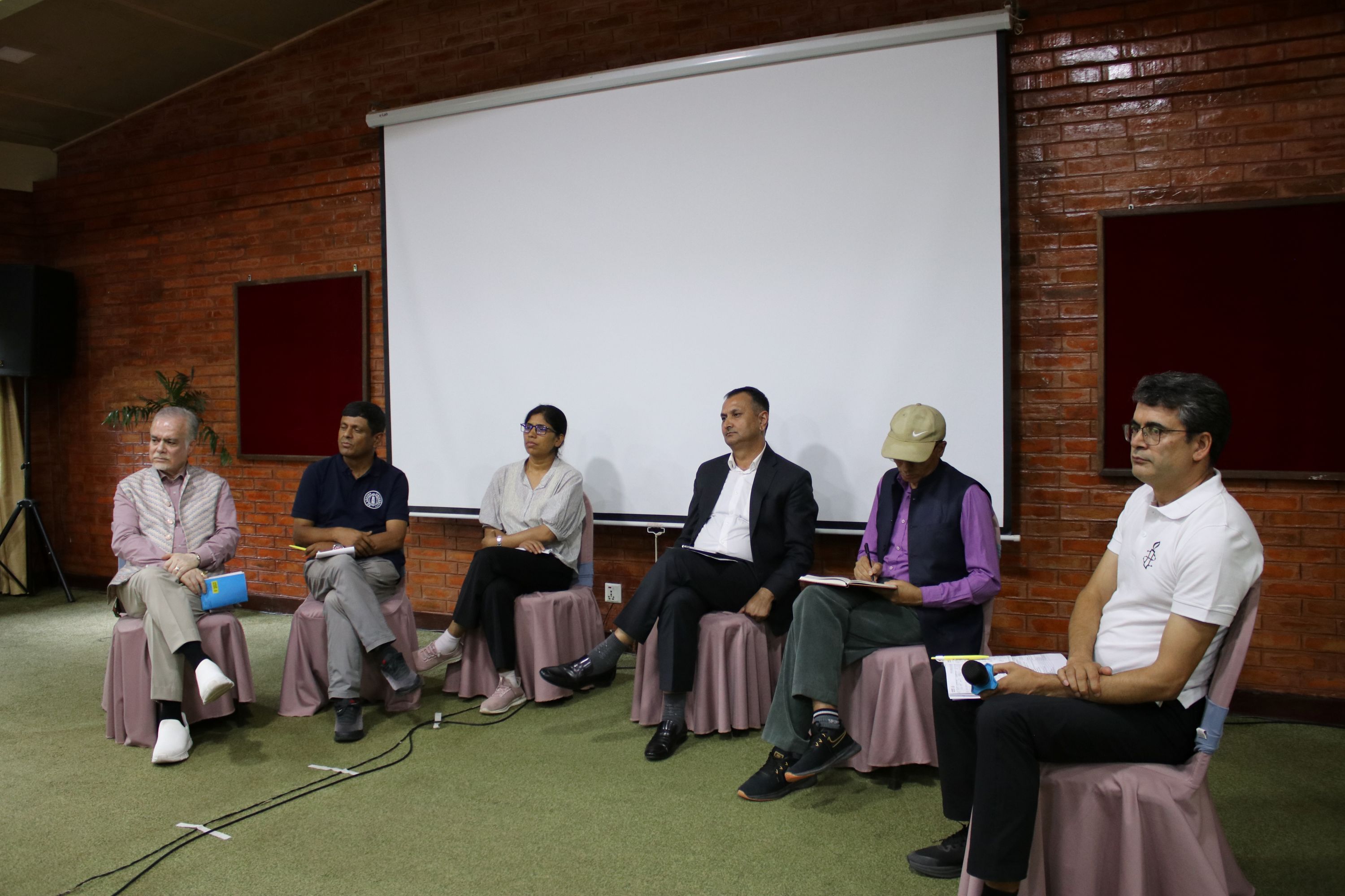 (Clockwise) Panelists Charan Prasai, human rights defender and former Chairperson of Amnesty International Nepal; Ram Bhandari, conflict victim and activist; Sushila Chaudhari, lawyer and conflict victim; Mahendra Bista, journalist and former Chairperson of the Press Council Nepal; and Suman Adhikari, conflict victim and activist, share their perspectives on the transitional justice process. The discussion is moderated by Rajan Kuikel (far right), journalist and former Chairperson of Amnesty International Nepal.