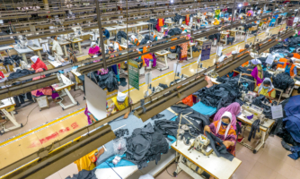 Women manufacturing clothes at a garment factory in Bangladesh. Photo: Getty Images Illustration: Amnesty International
